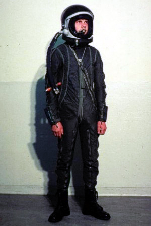 As seen in this image, the neckring is attached to the suit by straps and cords.