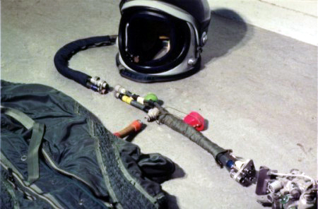 Another view of the pressure leads that go from the seat container to the helmet and suit.