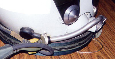 The modification to the oxygen and communications exit of the helmet. Also note the reflective tape on the back of the helmet.