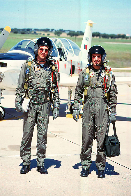 Student (on the right) and instructor after flying the TB-3 Epsilon trainer out of Beja. Both wear the HGU-55/P with boom microphone. Note the kidney protector on the instructor pilot.